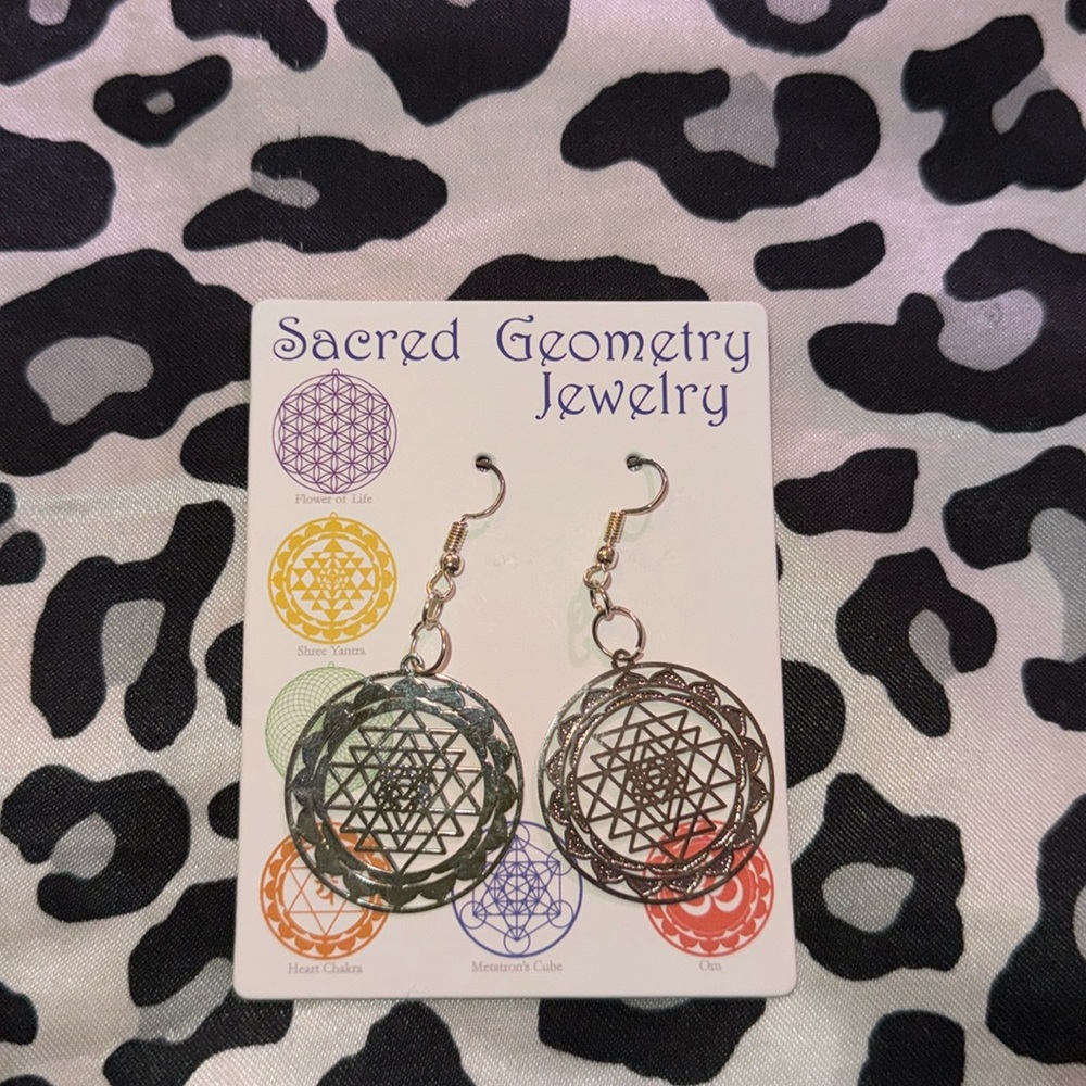 Cute round silver color sacred geometry earrings